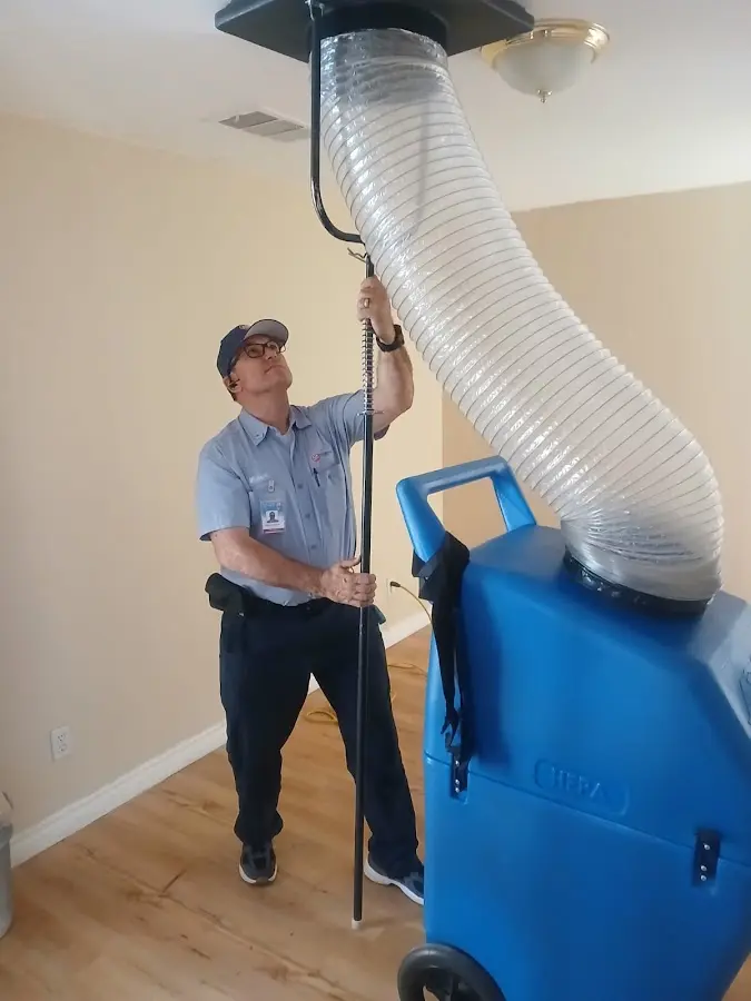 HVAC Installation technician using HEPA equipment in Sandy
